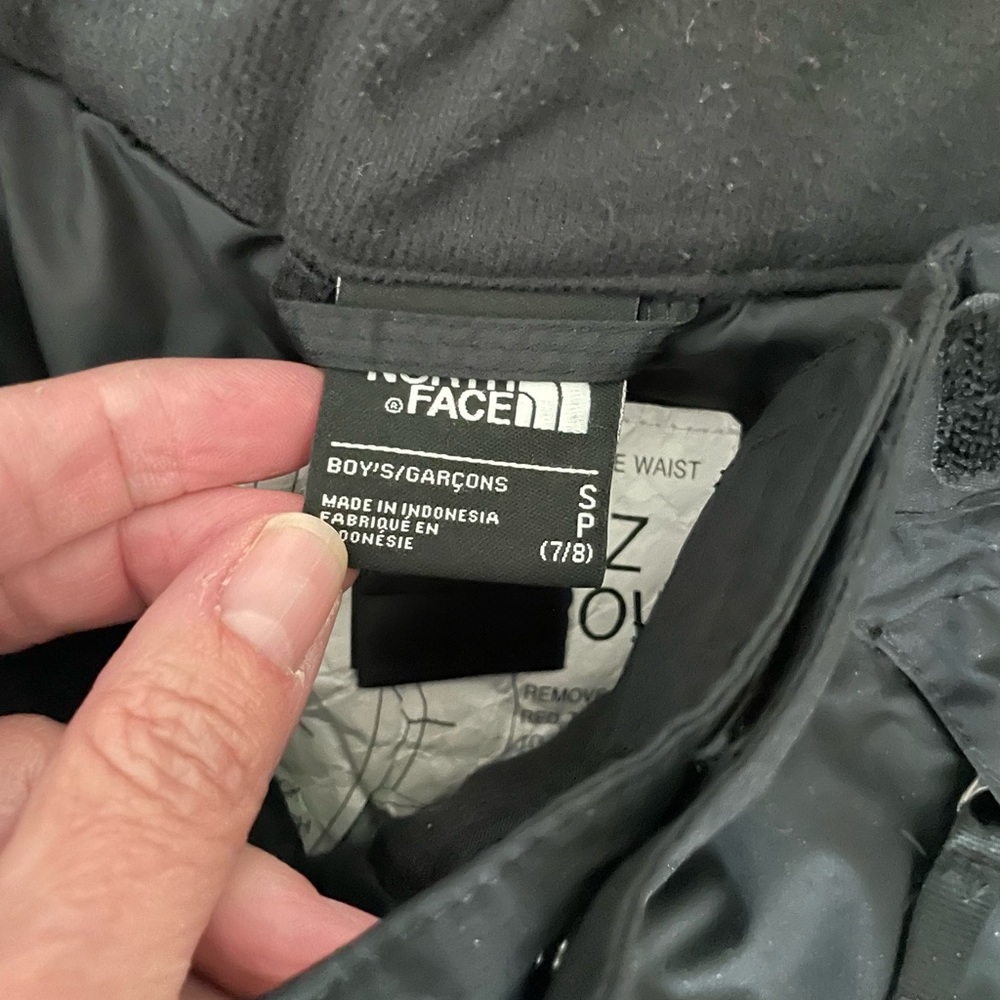 Kids black North Face Ski pants.